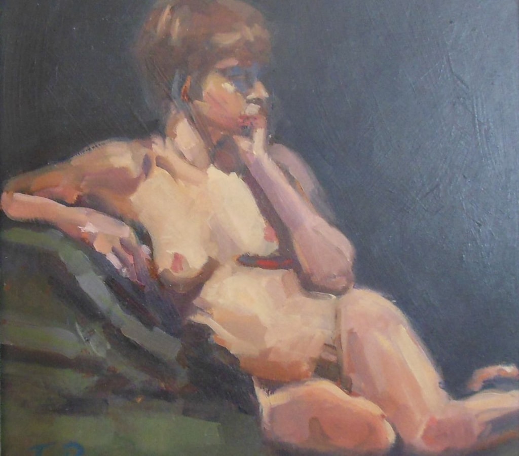 Nude study of a woman reclining on a green sofa.