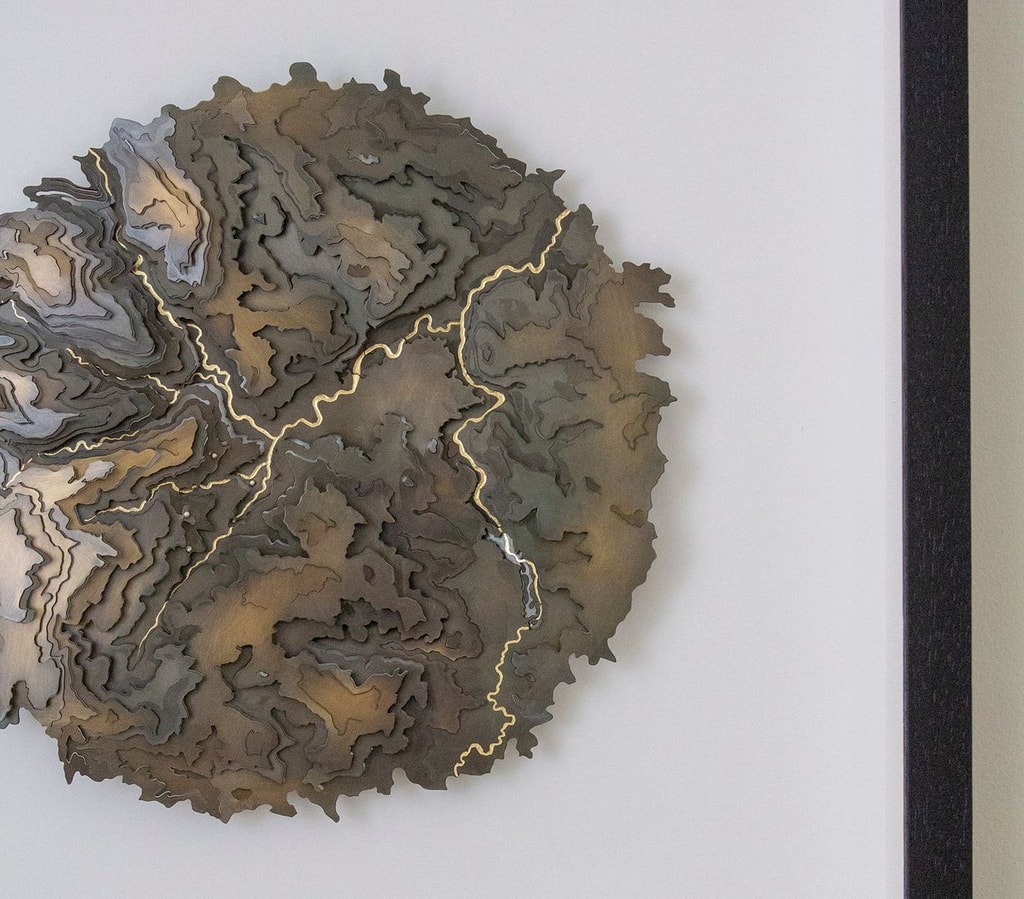 Contour map of Sheffield in brass by Holly Clifford.