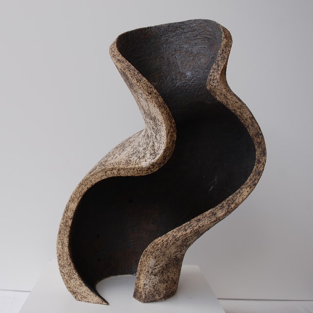Curved ceramic form by Claire Allam.